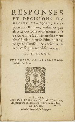 un vieux livre sur lequel figure l'image d'un homme portant une couronne