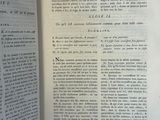 an open book that is sitting on a table
