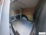a small bed in the back of a van
