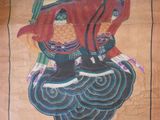 a picture of a painting of a woman on a wall