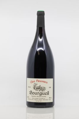 a bottle of wine that is sitting on a table