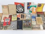a lot of books that are sitting on a table