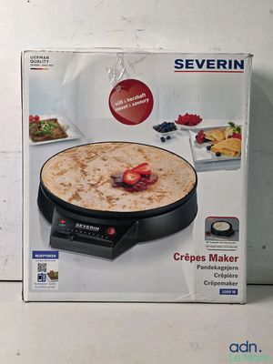 une boîte contenant un appareil à crêpes