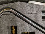 a case with a pipe and some other items inside of it