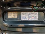 a close up of a car ' s trunk with a lot of information on it