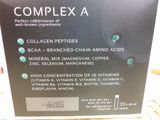 a box of complex a vitamin supplement on a table