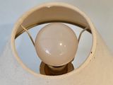a light that is on inside of a lamp shade