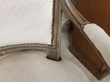a chair that has a piece of fabric on the back of it