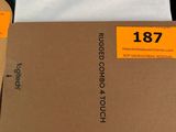a brown box with a brown label sitting on top of a table