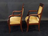a pair of chairs with yellow upholstered upholstered upholstered upholstered upholstered