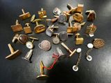 many different types of cuff watches on a table