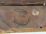 a wooden box with a label on it