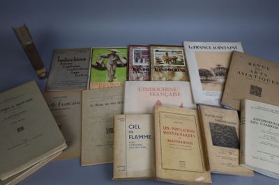 a lot of books that are sitting on a table