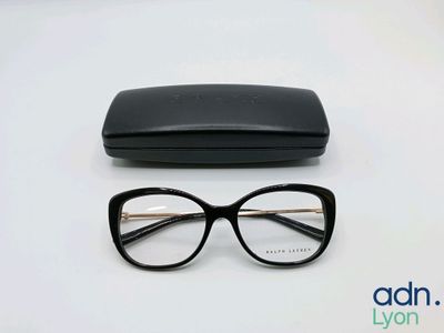a close up of a pair of glasses and a case on a table