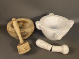 an image of a mortar and a bowl with a wooden mallet