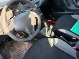 a small car with a steering wheel and a dashboard