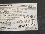 a close up of a label on the back of a laptop
