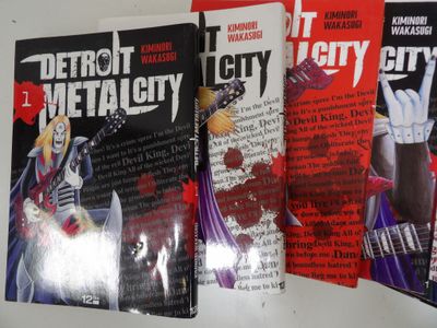 three books that are sitting on a table