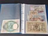a blue folder with a lot of different stamps on it