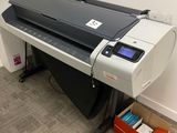 an image of a printer sitting on a desk in a room