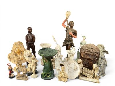 a lot of figurines that are sitting on a table