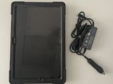 a tablet with a charger and a charger attached to it