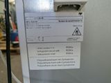 a label on the side of a refrigerator with a sticker on it