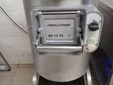 a machine that is sitting in a kitchen next to a counter