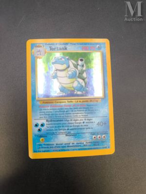 a close up of a pokemon card on a table