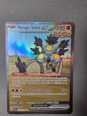 gros plan d'une carte pokemon sur une table