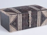 an image of a wooden box with a decorative design
