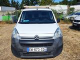 a white van that is parked in the grass