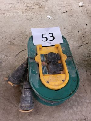 yellow and green toy car with a number on it sitting on the ground