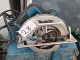 a circular saw that is sitting on top of a box