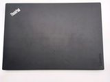 a black surface with a sticker on it