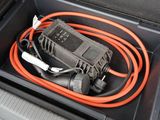 a car charger in the trunk of a car