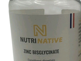 un flacon de bisglycinate de zinc nutritif à côté d'un flacon de bisglycinate de zinc nutritif