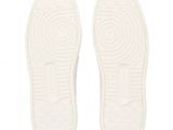 the soles of a pair of white shoes on a white background