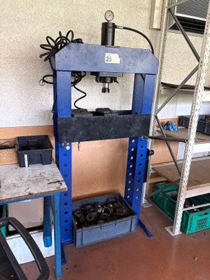 a machine that is sitting in a room with shelves