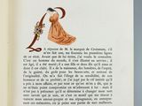 an open book with a picture of a woman in an orange dress
