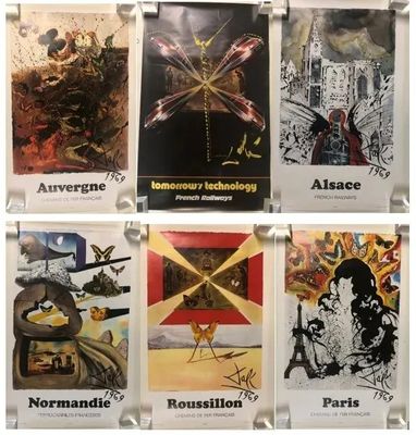 plusieurs affiches représentant différents types d'art accrochées à un mur