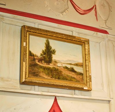 un tableau accroché au mur au-dessus d'une borne d'incendie rouge