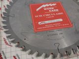 a circular saw blade on top of a piece of paper