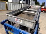 an image of a truck with a flat bed in the back of it
