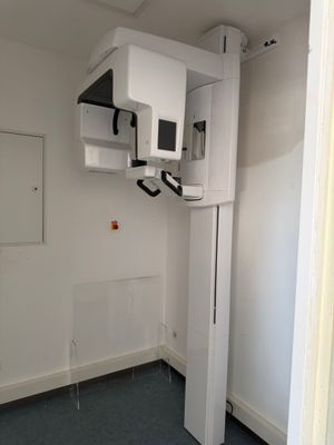 a room that has a white and black machine in it