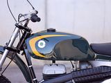 a close up of a motorcycle parked in front of a building