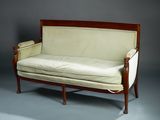 an image of a couch in a room with a gray background