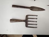 three old tools that are on a white table