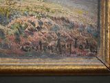 an oil painting of a field of flowers in a gold frame