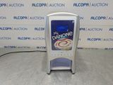 an image of a soda dispenser on a table